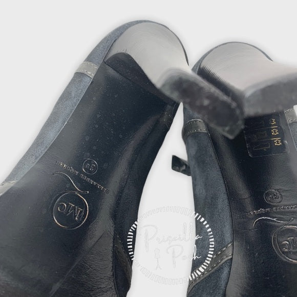 ALEXANDER MCQUEEN Leather-trimmed suede ankle boot